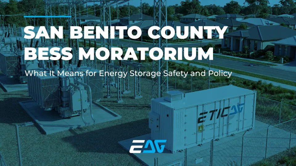 Utility-scale battery energy storage container next to electrical infrastructure in a residential area, representing San Benito County BESS moratorium